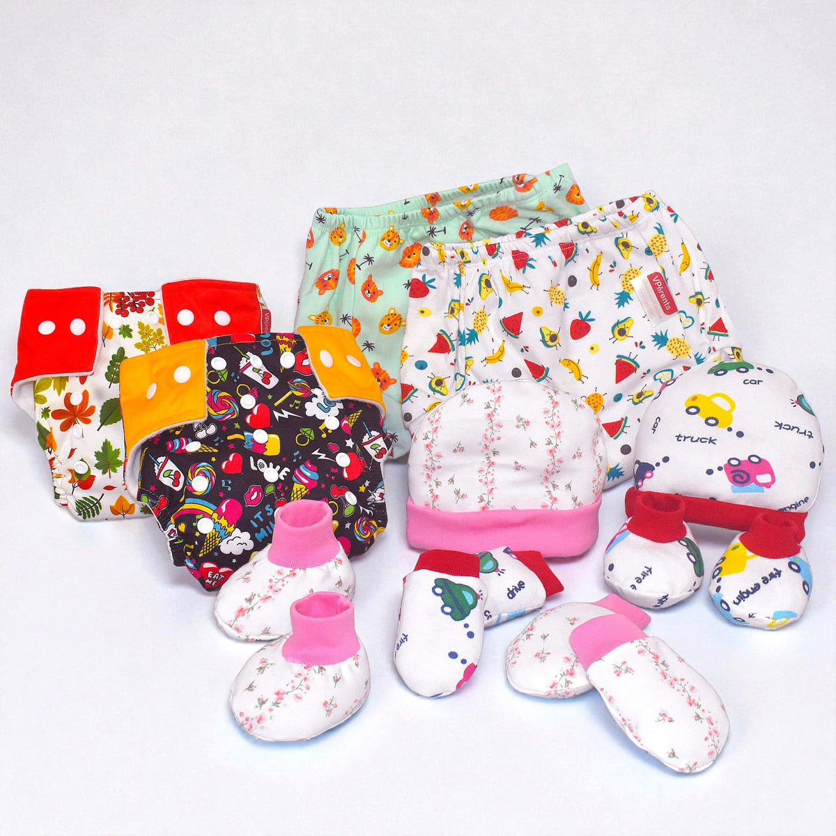 VParents New born Combo gift set for baby boy and girl cap mitten booties and diapers  with insert and underwears(0 -6 month) Assorted Design pack of 10